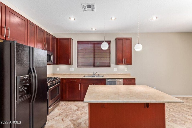 Building Photo - 15465 W Glenrosa Ave