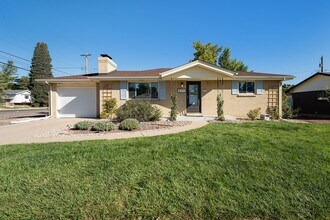 Building Photo - Charming Home w/Updated Kitchen and Yard B...