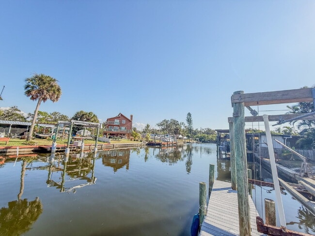 Building Photo - WATERFRONT POOL HOME ON A CANAL THAT LEADS STRAIGHT INTO TAMPA BAY - NEW DOCK AND SEAWALL COMING ...