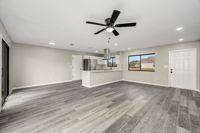 Building Photo - Charming Palm Bay Retreat - Perfect for Relaxation and Entertainment!