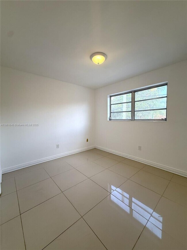 Building Photo - 4410 W Flagler St