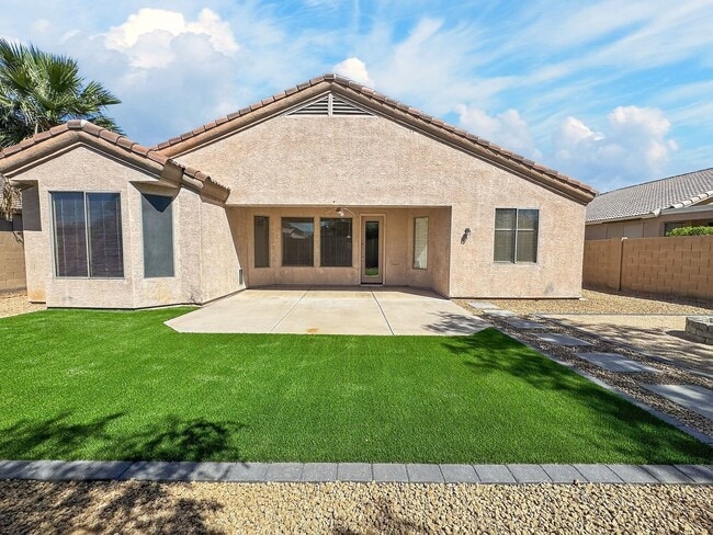 Building Photo - Single-level 4 bed, 2 bath home with tandem 3-car garage and RV gate.
