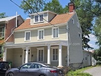 Building Photo - Downtown pet-friendly 3bd w Fenced Yard, Laundry, Screened Porch, Dishwasher, and nearby weekly f...