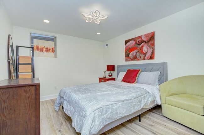 Building Photo - Discover the charm of this FULLY FURNISHED basement unit, tucked away in a beautifully updated bu...