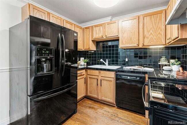 Building Photo - Sunny Corner Condo in the Heart of Capitol Hill | 2 Bed • 2 Bath • 795 Sq. Ft.