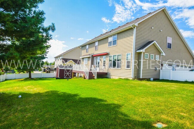Building Photo - 4 Bedroom 4 Bath Executive Home in West Des Moines with a fenced in yard and a 3-car garage