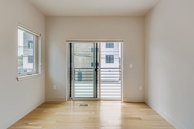 Building Photo - Swanky 1BR – New, Private Garage, Storage,...