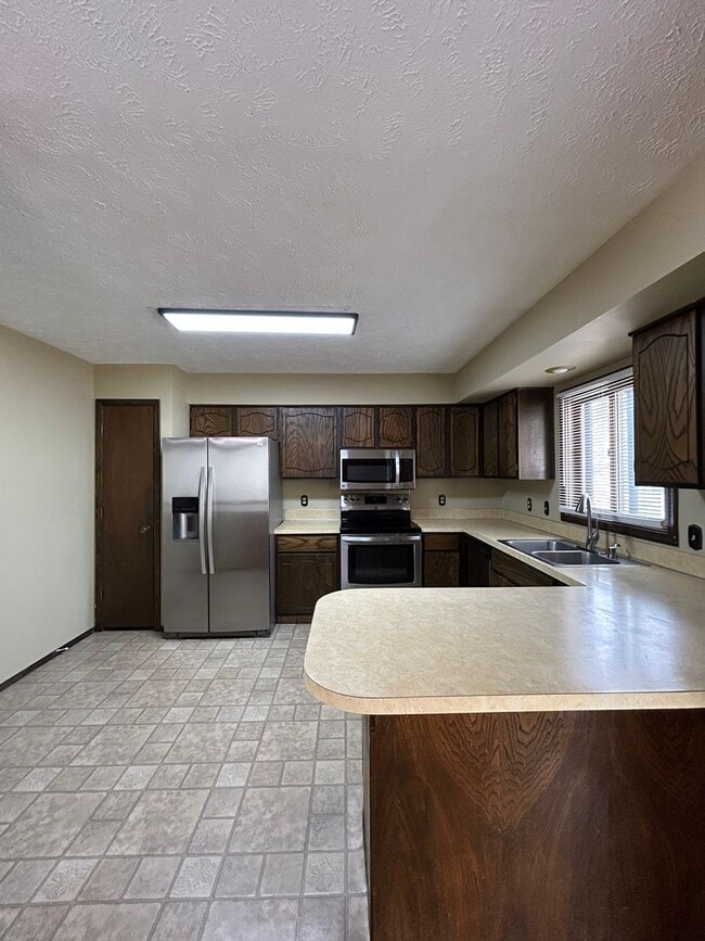 Building Photo - Spacious 3-Bedroom, 1-Bath Home with Garage & Basement in La Vista