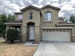 Building Photo - "Spacious 4-Bedroom Haven in Merced with 3 Full Baths & Elegant Granite Countertops!"