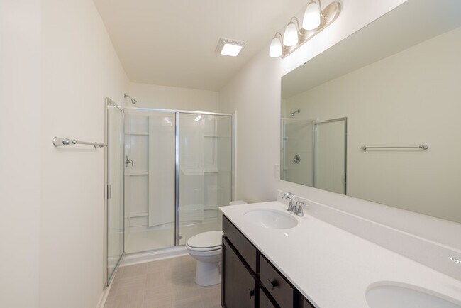 Building Photo - Cover front porch, two bedroom 2 1/2 bath townhome