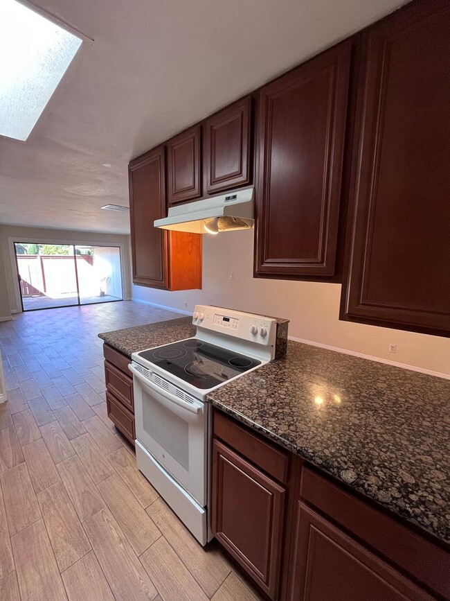 Building Photo - SINGLE STORY 3 BR/ 2 HOME WITH 2 CAR GARAGE