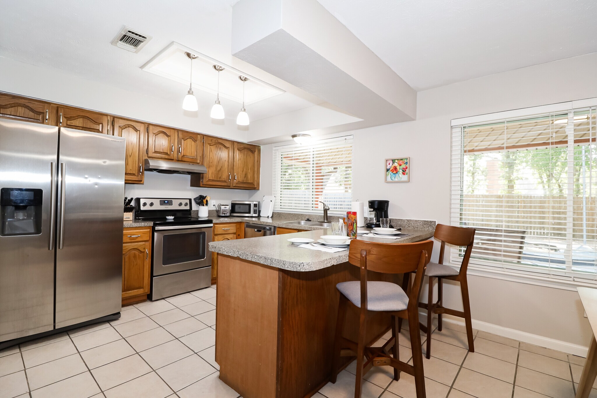 This is the kitchen serving counter and a lovely spot for that morning cup. - 2507 Holt Road