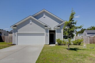 Building Photo - Spacious 4BR Rental with Stunning Kitchen & Covered Patio
