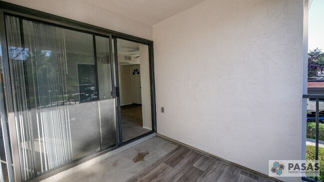 Building Photo - Bright Upgraded Condo w/ Quartz Kitchen, Covered Parking, Pool & Spa