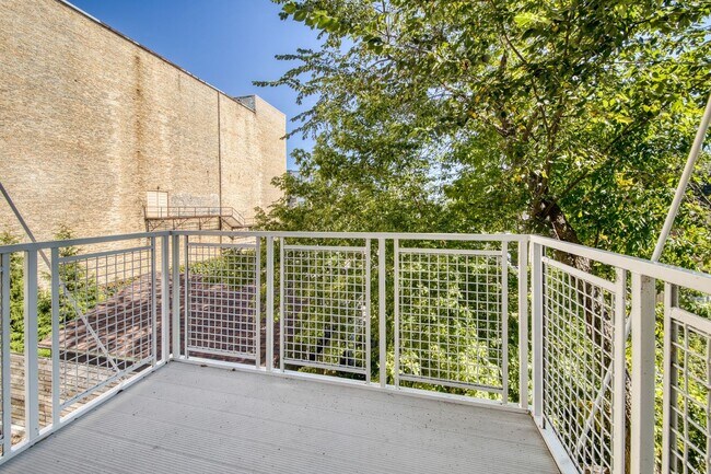 Building Photo - 5945 6th Ave