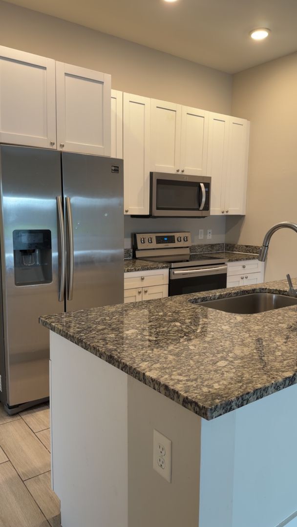 Building Photo - Duplex for rent on freshwater canal