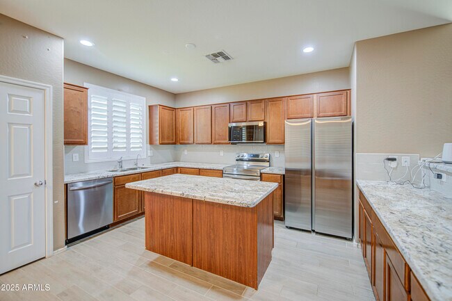 Building Photo - 6826 W Charter Oak Rd