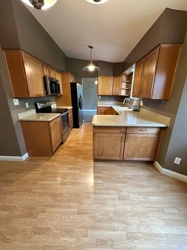 Kitchen with built-in microwave - 7393 S Washington Cir