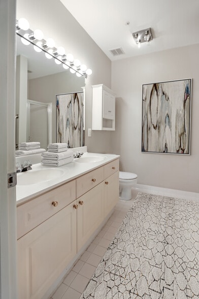 Master Bath with white cabinets (not pink) - 7710 Haynes Point Way