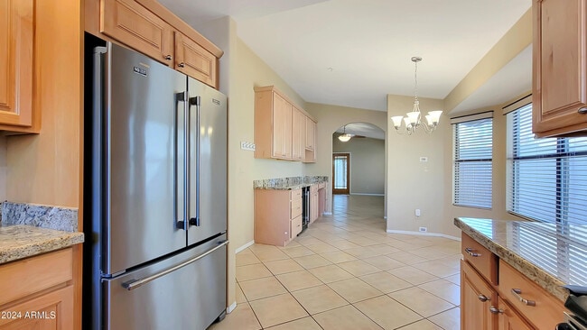 Building Photo - 8817 E Dahlia Dr