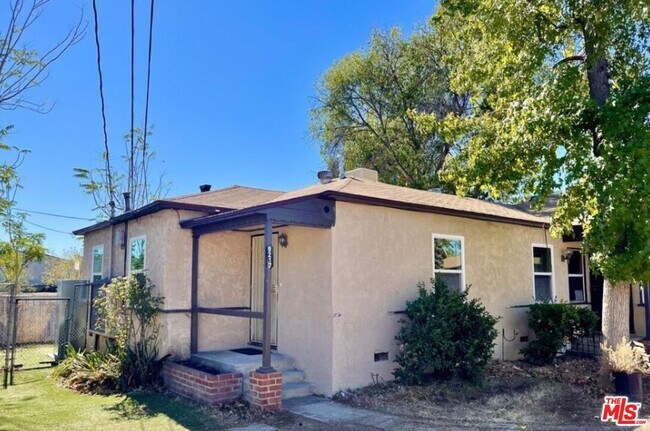 Building Photo - 9217 Langdon Ave