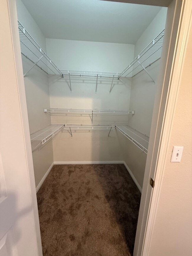 Building Photo - TWO BEDROOM TWO FULL BATH CONDO LOCATED IN A GATED COMMUNITY