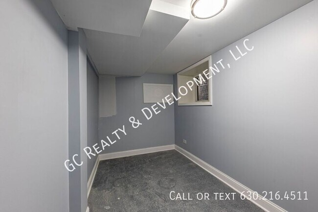 Building Photo - 6433 S Vernon Ave