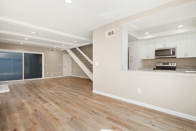 Building Photo - Renovated Townhome | Amazing South Coast Metro Costa Mesa Location