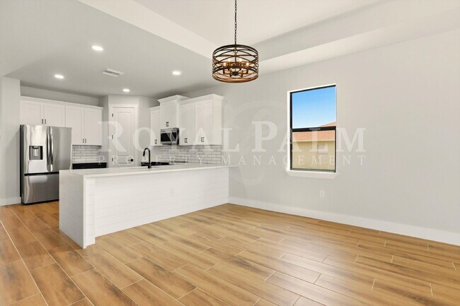 Building Photo - 3BR/2BA New Construction with Pool, Fence & Garage — Built Yesterday, Ready Today - Cape Coral