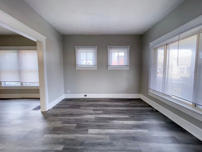 Building Photo - PRELEASING for AUGUST! Convenient Campus Living | 4BR with Fenced Yard & Covered Parking