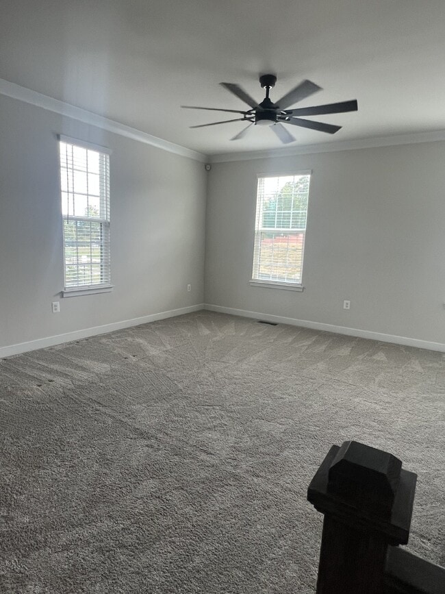 Building Photo - Exceptional 3-Level Corner Unit Townhome w...