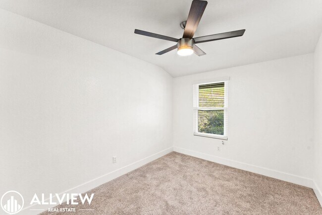 Building Photo - Upgraded 3 Bedroom Townhome in the Gated C...