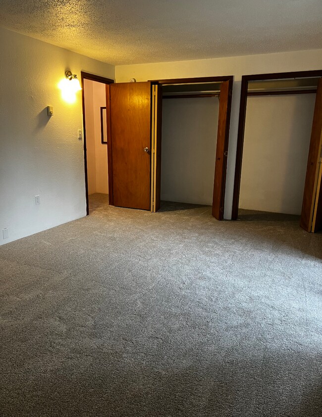 Building Photo - 2 Story Duplex Available. HUGE, FENCED YAR...