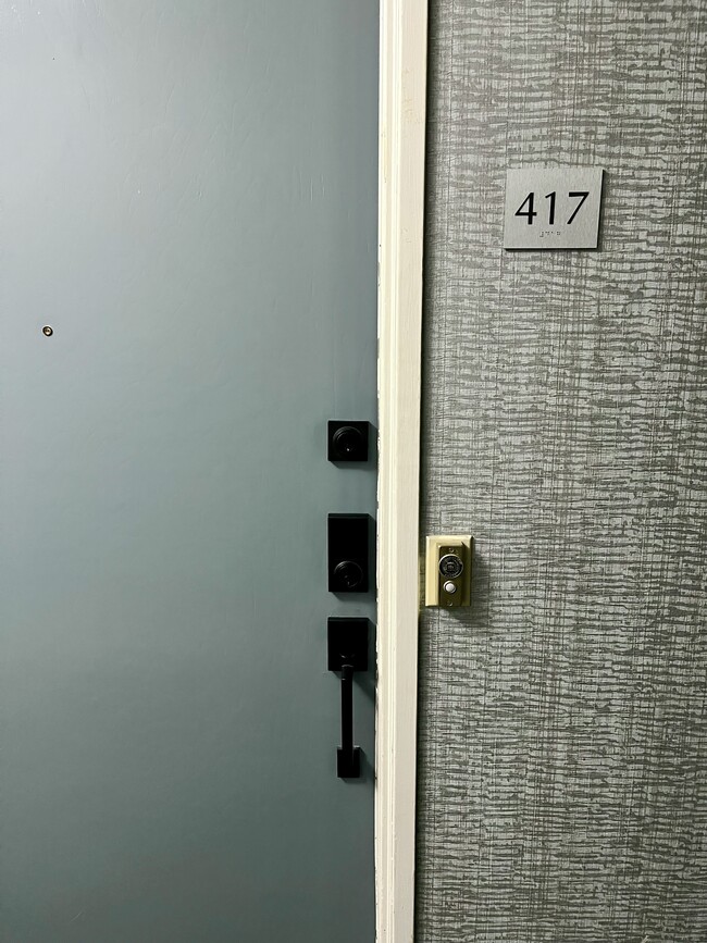 Smart lock to unit - 1115 S Elm Dr