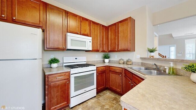 Building Photo - Coming Soon! Exceptional 2BR/2.5BA End Unit Townhome in College Park!