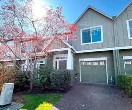 Building Photo - Elegant Arbor Townhome with Open Kitchen, W/D, Patio, and Soaking Tub