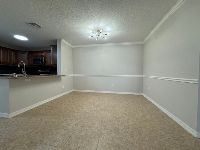 Building Photo - Oviedo 2/2 Condo with Tile & LVP Flooring, Updated Baths, New Paint & Appliances!