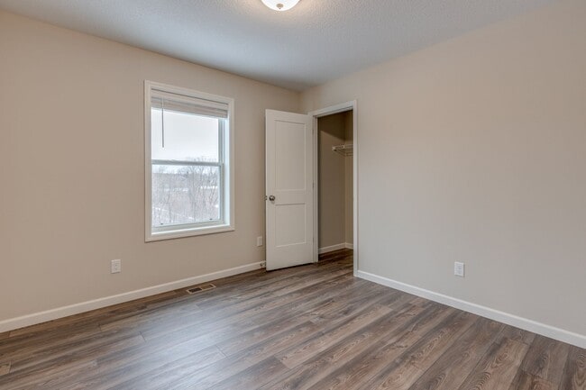 Building Photo - Newer Construction for RENT 3bd 3ba 2 car attached garage END UNIT available Jan 2026