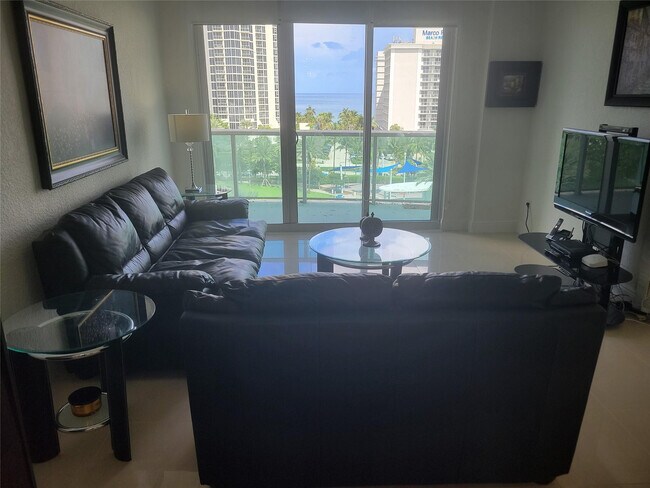 Building Photo - 19370 Collins Ave