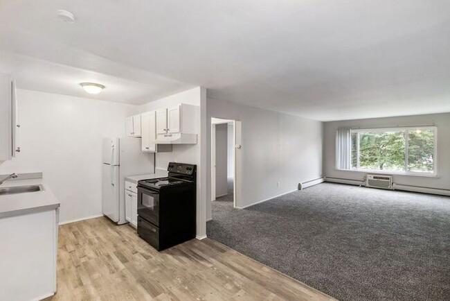 Building Photo - *Beautiful Apartment in Park Like Setting*...