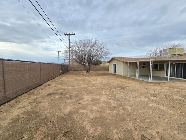 Building Photo - For Rent: Spacious 4-Bedroom / 3 Full bathrooms /  Home with Covered Patio & Modern Upgrades