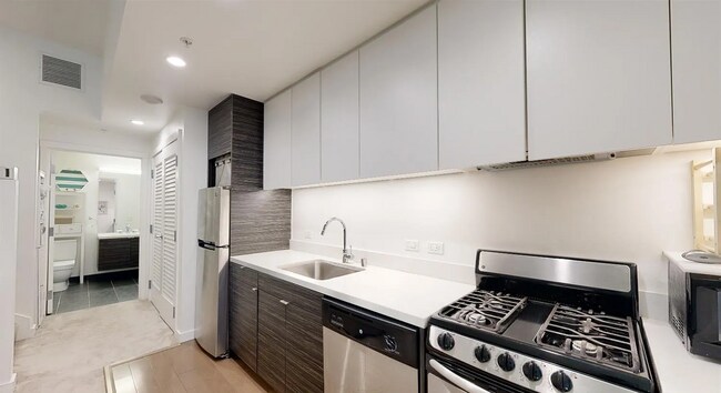 Building Photo - Corner view. Luxury. High end appliances. ...
