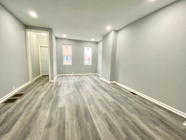Building Photo - Three-Bedroom Home with a Private Back Patio