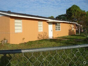 Building Photo - 696 SW 16th Terrace