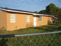 Building Photo - 696 SW 16th Terrace
