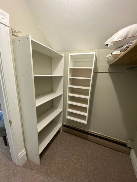 Closet with a lot of shelving - 523 21st St N