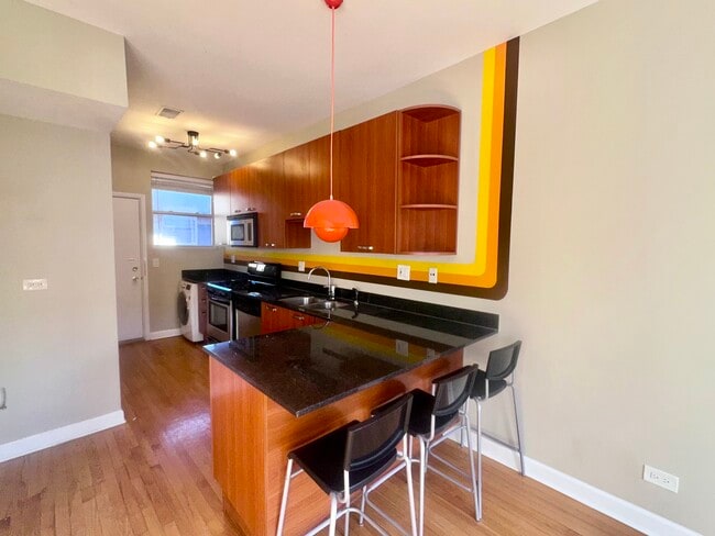 Building Photo - 1334 W Estes Ave