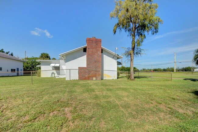 Building Photo - 6698 Belvedere Rd