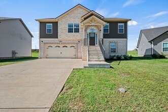 Building Photo - Beautiful Like-New Split Foyer Home Off Ex...
