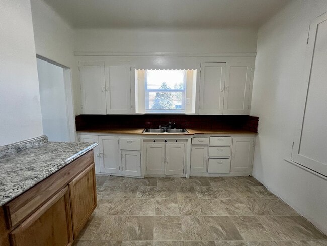 Building Photo - Non-Refundable & Security Deposit Total: $1500.00